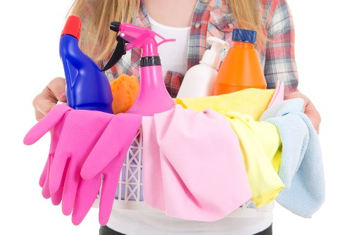 Professional domestic cleaner working in a Chelsea kitchen