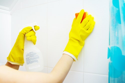 Local cleaning team carrying out detailed cleaning in a Chelsea apartment